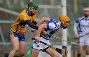 18 March 2012; Conor Dunne, Laois, in action against Colin Ryan, Clare. Allianz Hurling League, Division 1B, Round 3, Laois v Clare, O'Moore Park, Portlaoise, Co. Laois. Picture credit: Diarmuid Greene / SPORTSFILE