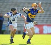 18 March 2012; Pa Bourke, Tipperary, in action against Tony Browne, Waterford. Allianz Hurling League, Division 1A, Round 3, Tipperary v Waterford, Semple Stadium, Thurles, Co. Tipperary. Picture credit: David Maher / SPORTSFILE