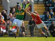 18 March 2012; Kieran Donaghy, Kerry, kicks a first half point despite the attention of Paudie Kissane, Cork. Allianz Football League, Division 1, Round 5, Cork v Kerry, Pairc Ui Chaoimh, Cork. Picture credit: Stephen McCarthy / SPORTSFILE