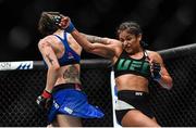 16 July 2017; Joanne Calderwood, left, in action against Cynthia Calvillo during their strawweight bout at UFC Fight Night Glasgow in the SSE Hydro Arena in Glasgow. Photo by Ramsey Cardy/Sportsfile