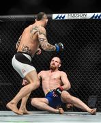 16 July 2017; Gunnar Nelson, right, is knocked out by Santiago Ponzinibbio in the first round of their welterweight bout at UFC Fight Night Glasgow in the SSE Hydro Arena in Glasgow. Photo by Ramsey Cardy/Sportsfile