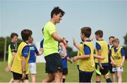 18 July 2017; Peter Dooley and Tom Daly of Leinster Rugby came out to the Bank of Ireland Summer Camp to meet up with some local young rugby talent at Portaloise RFC. Pictured is Tom Daly, as he recievies a high-five from a participant, at Portlaoise RFC, in Co. Laois. Photo by Seb Daly/Sportsfile