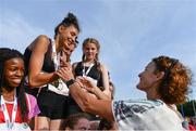 18 July 2017; Sophie O’Sullivan of Ballymore/Cobh AC, Co. Cork, is presented with a gold medal by her mother Sonia O'Sullivan after her team won the Sonia 3k Challenge Relay during the Cork City Sports event at CIT in Co. Cork. Photo by Sam Barnes/Sportsfile