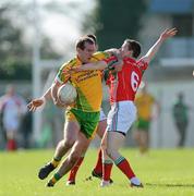 18 March 2012; Neil Gallagher, Donegal, in action against Donal Vaughan, Mayo. Allianz Football League, Division 1, Round 5, Donegal v Mayo, Fr. Tierney Park, Ballyshannon, Donegal. Picture credit: Oliver McVeigh / SPORTSFILE