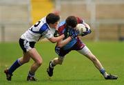 19 March 2012; Rory Brennan, St. Michael’s, Enniskillen, in action against Paul Gunning, St. Patrick’s, Maghera. MacRory Cup Final, St. Patrick’s, Maghera v St. Michael’s, Enniskillen, Bessbrook, Morgan Athletic Grounds, Armagh. Picture credit: Oliver McVeigh / SPORTSFILE