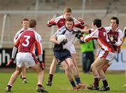 19 March 2012; Eoin Devine, St. Columb’s, Derry, in action against Conor Moley, Michael Murphy and Ciaran McCooey, St. Paul’s, Bessbrook. MacLarnon Cup Final, St. Columb’s, Derry v St. Paul’s, Bessbrook, Morgan Athletic Grounds, Armagh. Picture credit: Oliver McVeigh / SPORTSFILE