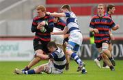 19 March 2012; Eoghan Kelly, St. Munchin’s, is tackled by Sonny O'Dwyer, left, and James Feehan, Rockwell. Avonmore Munster Schools Senior Cup Final, St. Munchin’s College v Rockwell College, Thomond Park, Limerick. Picture credit: Diarmuid Greene / SPORTSFILE