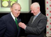 9 March 2012; Dr. Pat Hickey, President of the OCI, with Paddy Kavanagh, swimming, a member of the 1948 Olympic Team, and his Olympic Medal of Honour. Farmleigh House, Phoenix Park, Dublin 15. Picture credit: Ray McManus / SPORTSFILE