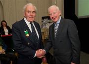 9 March 2012; Dr. Pat Hickey, President of the OCI, with Morgan McElligott, rowing, left, a member of the 1948 Olympic Team, and his Olympic Medal of Honour. Farmleigh House, Phoenix Park, Dublin 15. Picture credit: Ray McManus / SPORTSFILE