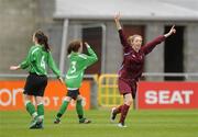 21 March 2012; Megan Connolly, Christ the King Girls Secondary School, Cork, celebrates after scoring her and her side's second goal of the game as Charmine McDermott, 4, and Melissa McDermott, 3, Moville Community School, Donegal, look on. Umbro FAI Schools Senior Girls Cup Final, Moville Community School, Donegal v Christ the King Girls Secondary School, Cork, Tallaght Stadium, Tallaght, Dublin. Picture credit: Pat Murphy / SPORTSFILE