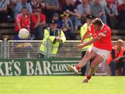 14 July 2002; Colin Corkery of Cork scores a point from a free during the Bank of Ireland Munster Senior Football Championship Final match between Cork and Tipperary at Semple Stadium in Thurles, Tipperary. Photo by Brendan Moran/Sportsfile