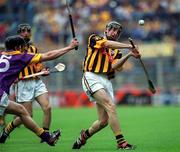 7 July 2002; Shane Coonan of Kilkenny shoots under pressure from Donal O'Leary of Wexford during the Leinster Minor Hurling Championship Final match between Kilkenny and Wexford at Croke Park in Dublin. Photo by Aoife Rice/Sportsfile