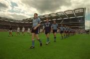14 July 2002; Dublin captain Coman Goggins leads his side in the pre-match parade before the Bank of Ireland Leinster Senior Football Championship Final match between Dublin and Kildare at Croke Park in Dublin. Photo by Damien Eagers/Sportsfile