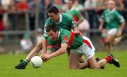 13 July 2002; James Horan of Mayo in action against Stephen Lucey of Limerick during the Bank of Ireland All-Ireland Senior Football Championship Qualifier Round 3 match between Mayo and Limerick at Dr Hyde Park in Roscommon. Photo by Damien Eagers/Sportsfile