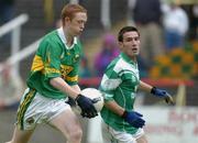 7 July 2002; Colm Cooper of Kerry in action against Michael Lilly of Fermanagh during the All-Ireland Senior Football Championship Qualifier Round 3 match between Kerry and Fermanagh at O'Moore Park in Portlaoise, Laois. Photo by Damien Eagers/Sportsfile