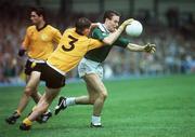 19 August 1990; Bernard Flynn of Meath is tackled by Matt Gallagher of Donegal during the All-Ireland Senior Football Championship Semi-Final match between Meath and Donegal at Croke Park in Dublin. Photo by Ray McManus/Sportsfile