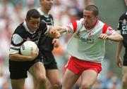 21 July 2002; Eamonn O'Hara of Sligo in action against Stephen O'Neill of Tyrone during the All-Ireland Senior Football Championship Qualifier Round 4 match between Sligo and Tyrone at Croke Park in Dublin. Photo by Brian Lawless/Sportsfile