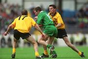 21 July 2002; Richie Kealy of Meath in action against Eamon Doherty and Christy Toye, right, of Donegal during the All-Ireland Senior Football Championship Qualifier Round 4 match between Meath and Donegal at Croke Park. Photo by Aoife Rice/Sportsfile