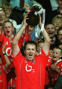 21 July 2002; Cork captain Colin Corkery lifts the cup after the Bank of Ireland Munster Football Final Replay match between Cork and Tipperary at Páirc Uí Chaoimh in Cork. Photo by Brendan Moran/Sportsfile