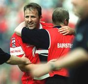 21 July 2002; Cork captain Colin Corkery celebrates with manager Larry Tompkins after the Bank of Ireland Munster Football Final Replay match between Cork and Tipperary at Páirc Uí Chaoimh in Cork. Photo by Brendan Moran/Sportsfile