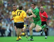21 July 2002; Nigel Crawford of Meath is tackled by Eamon Doherty of Donegal during the All-Ireland Senior Football Championship Qualifier Round 4 match between Meath and Donegal at Croke Park. Photo by Brian Lawless/Sportsfile