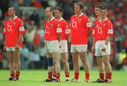 21 July 2002; Cork players, from left, Brendan Ger O'Sullivan, Philip Clifford, Joe Kavanagh, Colin Corkery, Maurice McCarthy and Fionan Murray stand for the National Anthem before the Bank of Ireland Munster Football Final Replay match between Cork and Tipperary at Páirc Uí Chaoimh in Cork. Photo by Brendan Moran/Sportsfile
