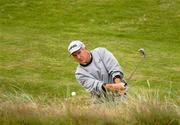 24 July 2002; Denis O'Sullivan plays out of the bunker onto the 10th green during a practice round ahead of the Senior British Open at Royal County Down Golf Club in Newcastle, Down. Photo by Matt Browne/Sportsfile