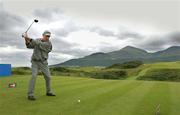 24 July 2002; Denis O'Sullivan takes a practice swing before teeing off on the 9th during a practice round ahead of the Senior British Open at Royal County Down Golf Club in Newcastle, Down. Photo by Matt Browne/Sportsfile