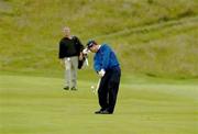 24 July 2002; Tom Watson plays his second shot from the 9th fairway during a practice round ahead of the Senior British Open at Royal County Down Golf Club in Newcastle, Down. Photo by Matt Browne/Sportsfile