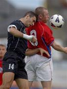 24 July 2002; Trevor Molloy of Shelbourne in action against Adrian Pulis of Hibernians during the UEFA Cup First Qualifying Round Second Leg match between Shelbourne and Hibernians at Tolka Park in Dublin. Photo by Damien Eagers/Sportsfile
