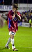 24 July 2002; Richie Baker of Shelbourne holds his head in his hands after defeat in the UEFA Cup First Qualifying Round Second Leg match between Shelbourne and Hibernians at Tolka Park in Dublin. Photo by David Maher/Sportsfile