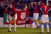 24 July 2002; Shelbourne players, David Crawley, Barry Prendeville, Owen Heary and Ollie Cahill dejected after defeat in the UEFA Cup First Qualifying Round Second Leg match between Shelbourne and Hibernians at Tolka Park in Dublin. Photo by David Maher/Sportsfile