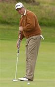 25 July 2002; Priscillo Diniz watches his putt on the 10th green during day one of the Senior British Open at Royal County Down Golf Club in Newcastle, Down. Photo by Matt Browne/Sportsfile