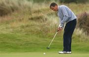 25 July 2002; Victor Garcia watches his putt on the 5th green during day one of the Senior British Open at Royal County Down Golf Club in Newcastle, Down. Photo by Matt Browne/Sportsfile