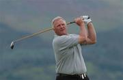 25 July 2002; Russell Weir watches his drive from the 11th tee box during day one of the Senior British Open at Royal County Down Golf Club in Newcastle, Down. Photo by Matt Browne/Sportsfile