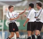 25 July 2002; Martin Reilly of Dundalk, left, celebrates with team-mates Robbie Bruton and Donal Broughan after scoring a goal during the FAI Carlsberg Senior Cup Second Round match between Dundalk and Shamrock Rovers at Oriel Park in Dundalk. Photo by David Maher/Sportsfile