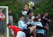 26 July 2002; St Patrick's Athletic's goalkeeper Seamus Kelly gathers possession ahead of team-mate Colm Foley and David Goaldby and Mark Herrick of Galway United during the FAI Carlsberg Senior Cup Second Round match between St Patrick's Athletic and Galway United at Richmond Park in Dublin. Photo by David Maher/Sportsfile