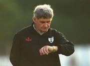 27 July 2002; Kildare manager Mick O'Dwyer checks his watch towards the end of the Bank of Ireland All-Ireland Football Championship Qualifier match between Kerry and Kildare at Semple Stadium in Thurles, Tipperary. Photo by Ray McManus/Sportsfile
