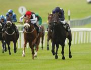 27 July 2002; Imperial Dancer, with Chris Catlin up, right, races clear of Sights On Gold, Pat Smullen up, center, and Fionns Folly, Nick McCullagh up, on their way to winning The Meld Stakes at the Curragh Racecourse in Kildare. Photo by Aoife Rice/Sportsfile