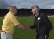 27 July 2002; Kerry manager Paidí Ó Sé shakes hands with Kildare manager Mick O'Dwyer before the Bank of Ireland All-Ireland Football Championship Qualifier match between Kerry and Kildare at Semple Stadium in Thurles, Tipperary. Photo by Brendan Moran/Sportsfile