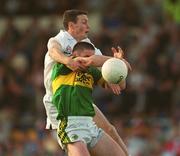 27 July 2002; Darragh Ó Sé of Kerry in action against Padraig Hurley of Kildare during the Bank of Ireland All-Ireland Football Championship Qualifier match between Kerry and Kildare at Semple Stadium in Thurles, Tipperary. Photo by Ray McManus/Sportsfile