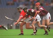 28 July 2002; Stephen O'Sullivan of Cork in action against James Farrell of Galway during the All-Ireland Minor Hurling Championship Quarter-Final match between Cork and Galway at Croke Park in Dublin. Photo by Ray McManus/Sportsfile