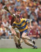 28 July 2002; Eugene Cloonan of Galway breaks his hurl on the forehead of Brian Quinn of Clare as he attempts to prevent him from clearing during the Guinness All-Ireland Senior Hurling Championship Quarter-Final match between Clare and Galway at Croke Park. Photo by Ray McManus/Sportsfile