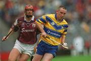 28 July 2002; Colin Lynch of Clare, in action against Ollie Canning of Galway during the Guinness All-Ireland Senior Hurling Championship Quarter-Final match between Clare and Galway at Croke Park. Photo by Ray McManus/Sportsfile
