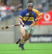 28 July 2002; Eoin Kelly of Tipperary in action against Johnny Campbell of Antrim during the All-Ireland Senior Hurling Championship Quarter-Final match between Antrim and Tipperary at Croke Park in Dublin. Photo by Aoife Rice/Sportsfile