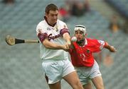28 July 2002; Aidan Ryan of Galway in action against Brendan Barry of Cork during the All-Ireland Minor Hurling Championship Quarter-Final match between Cork and Galway at Croke Park in Dublin. Photo by Brian Lawless/Sportsfile