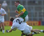 27 July 2002; Darragh Ó Sé of Kerry in action against Brian Lacey of Kildare during the Bank of Ireland All-Ireland Football Championship Qualifier match between Kerry and Kildare at Semple Stadium in Thurles, Tipperary. Photo by Brendan Moran/Sportsfile