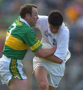 27 July 2002; Martin Lynch of Kildare is tackled by Seamus Moynihan of Kerry during the Bank of Ireland All-Ireland Football Championship Qualifier match between Kerry and Kildare at Semple Stadium in Thurles, Tipperary. Photo by Brendan Moran/Sportsfile