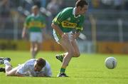 27 July 2002; John Sheehan of Kerry in action against Eddie McCormack of Kildare during the Bank of Ireland All-Ireland Football Championship Qualifier match between Kerry and Kildare at Semple Stadium in Thurles, Tipperary. Photo by Brendan Moran/Sportsfile