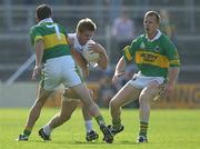 27 July 2002; Eddie McCormack of Kildare in action against John Sheehan, left, and Liam Hassett of Kerry during the Bank of Ireland All-Ireland Football Championship Qualifier match between Kerry and Kildare at Semple Stadium in Thurles, Tipperary. Photo by Brendan Moran/Sportsfile